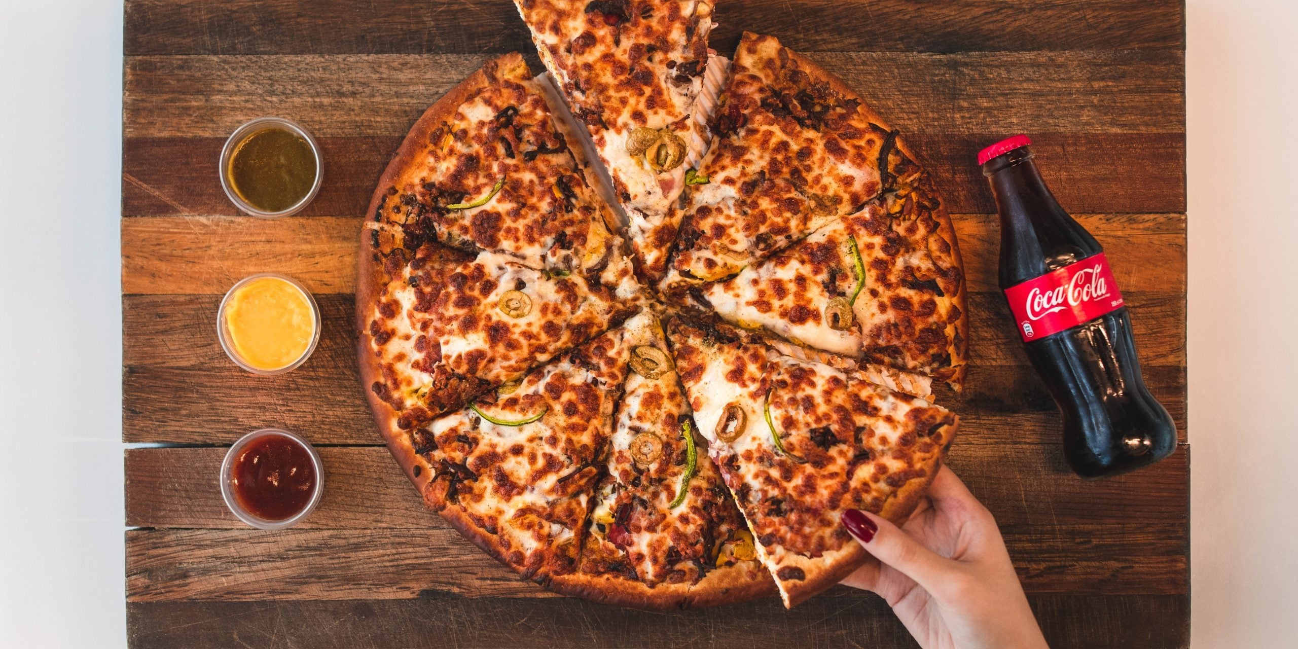 pizza table with coke
